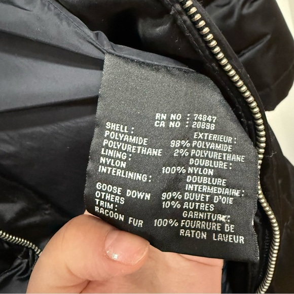 Andrew Marc women’s black puffer coat with raccoon trim - Picture 9 of 9